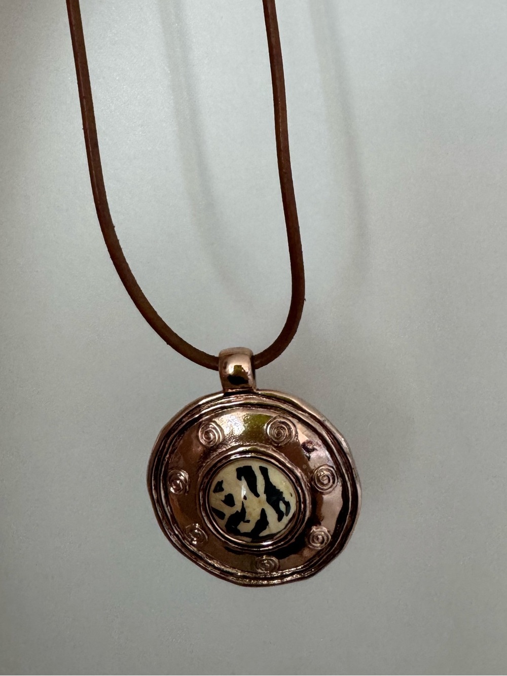 Round Copper Pendant Necklace with Animal Print Accent Gold color 16”